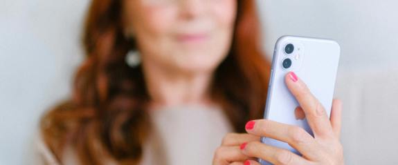 woman holding phone